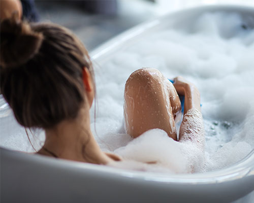 woman in repaired bathrub